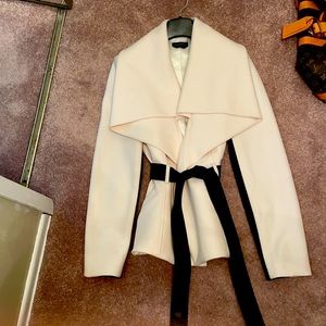 Black and white coat! With leather accents on sleeves and belt!